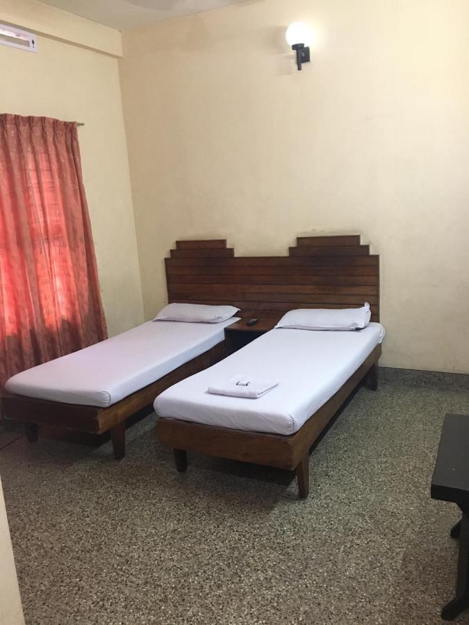 Nellimoottil Guest House Kottayam Zimmer foto